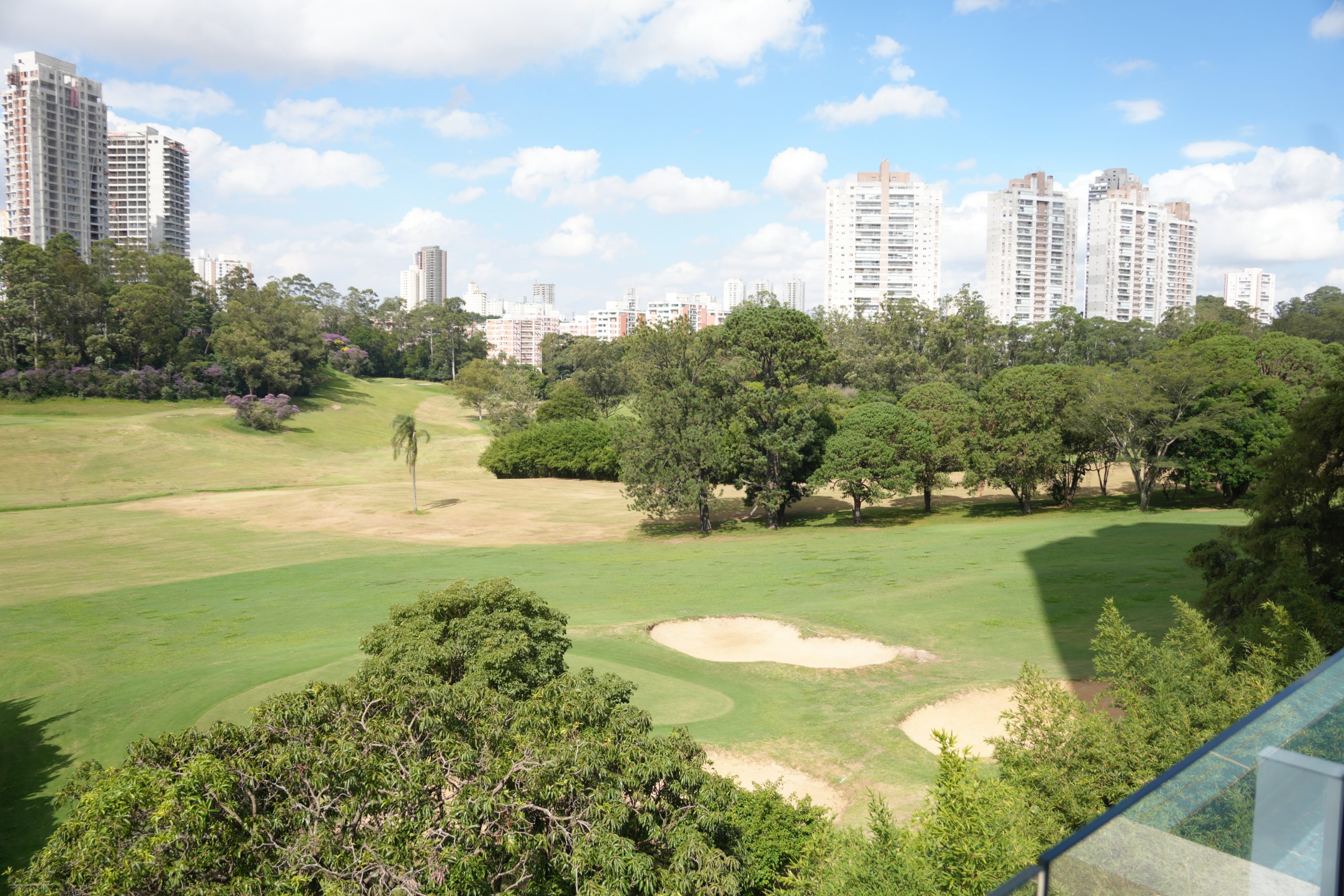 Vista da piscina para o Campo de Golf